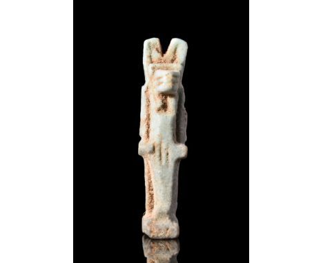 Late Period, Ca. 664-332 BC.A faience amulet of Anubis, a god associated with death and the afterlife. He is depicted stridin