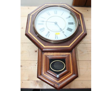 A 19th century Seth Thomas drop dial wall clock, 22" high 