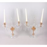A pair of two-branch glass candlesticks, hung drops with central spire finial, 15" high
