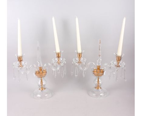 A pair of two-branch glass candlesticks, hung drops with central spire finial, 15" high 