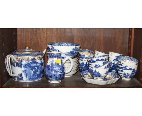 A 19th century porcelain part "Willow" pattern teaset, comprising six teacups, eight tea bowls, nine saucers, a sugar bowl, a