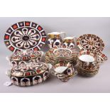 A Royal Crown Derby "Old Imari" 1128 pattern part dinner service, comprising two vegetable tureens
