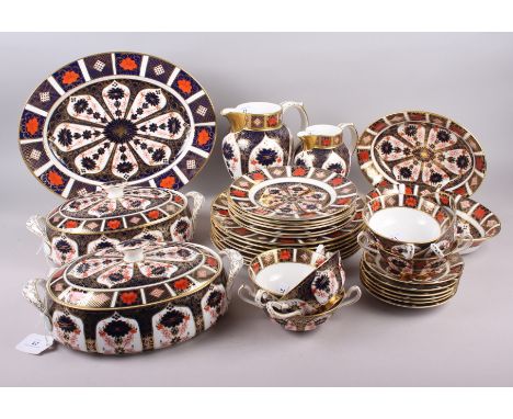 A Royal Crown Derby "Old Imari" 1128 pattern part dinner service, comprising two vegetable tureens and covers, two open dishe