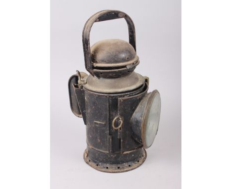 A japanned railway lamp, manufactured by C Polkey, Birmingham 