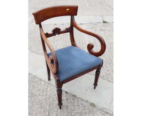An early 19th century mahogany bar back carver dining chair with drop-in seat, on turned supports, a 19th century mahogany co