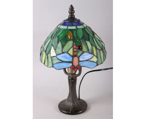 A Tiffany style table lamp with coloured glass panels, decorated dragonflies, 13 1/4" high 