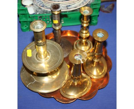A 17th century design brass candlestick, a pair of Georgian candlesticks, two other candlesticks, a copper tray and a brass w