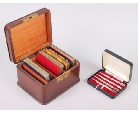 A leather playing card box, two bezique markers, a cased set of four sterling silver bridge pencils and a collection of assor