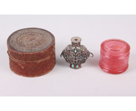 A Peking glass ring box, a circular cinnabar lacquer box and Chinese white metal snuff bottle, inlaid turquoise and coral, 2 