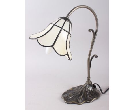 A Tiffany design table lamp with cream coloured glass panels, on metal base, decorated relief flower buds, 14 1/2" high 