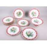 A Continental porcelain dessert service with hand-painted floral decoration and pink and gilt