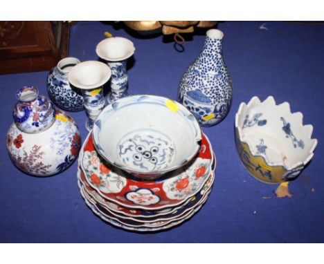 A 19th century Chinese blue and white vase, decorated figures carrying an urn (cut down), a blue and white ginger jar, two gu