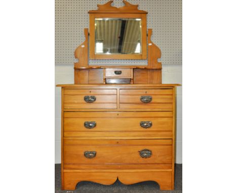 A dressing chest having vanity drawer and mirror back above a two over two chest, all raised on bracket legs. Measure; 160cm 