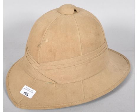 A WWII Second World War era Pith helmet with label to the inside. 