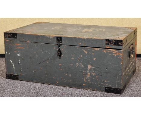 A 20th Century vintage wooden travelling trunk with partial western railways paper label to top along with contents. Measures