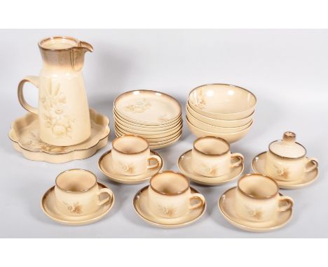 A Denby breakfast coffee service with six cups and saucers, four bowls, eight side plates and a coffee pot. Coffee pot measur