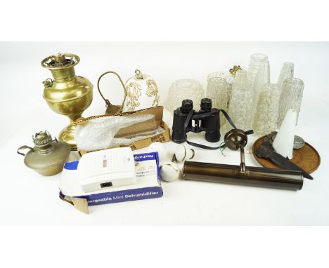 A collection of assorted lighting to include; a brass oil lamp along with a quantity of 1950's moulded glass shades and other