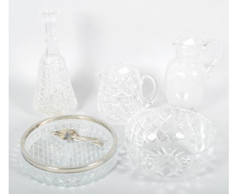 A collection of assorted cut glass to include; decanter, jug, bowl and centre bowl along with an etched glass jug. Tallest me