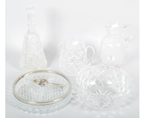 A collection of assorted cut glass to include; decanter, jug, bowl and centre bowl along with an etched glass jug. Tallest me