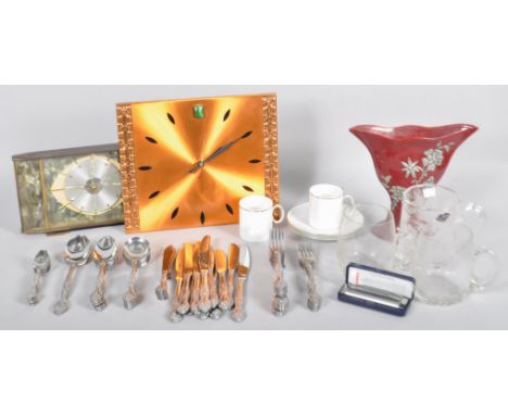 A collection of assorted items to include; flatware, Thomas part coffee service, harmonica, copper craft clock and a Metamec 