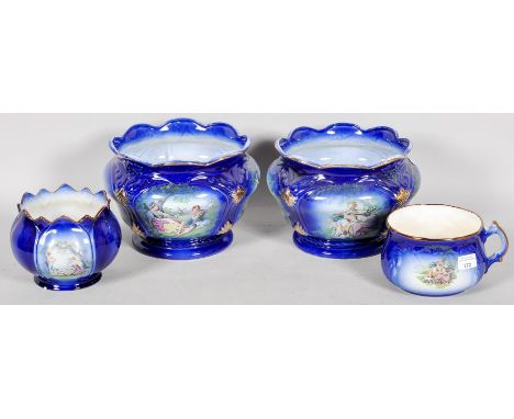 A set of Staffordshire ceramic planters in blue and white with scenes