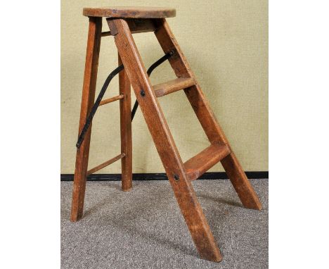 An early 20th Century oak folding step ladder stool. Measures; 52cm. 