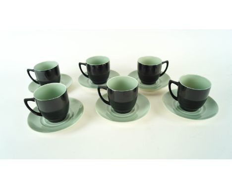 A set of six Branksome coffee cups and saucers in a two tone green and black colourway. 