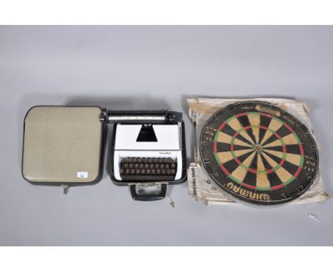 A Lilliant typewriter and a dart board