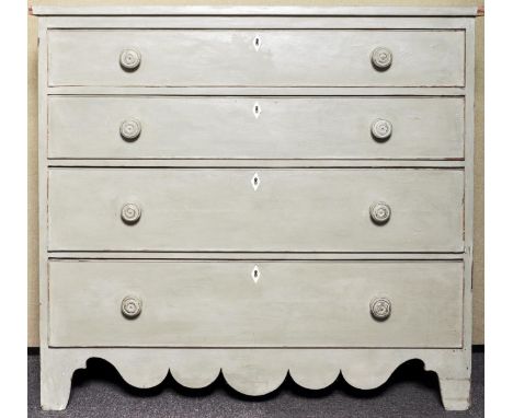 A painted chest of drawers having a run of four graduating drawers, each with knob handles and rhombus escutcheon, all raised