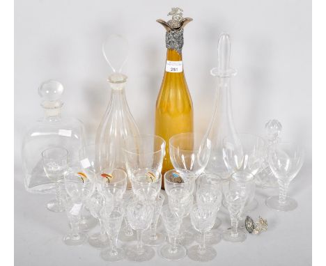 A collection of glassware to include four decanter of varying shapes and sizes. Tallest measures; 37cm. 