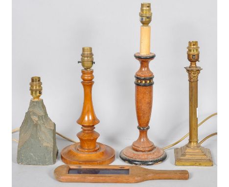 A green slate lamp base with three others and a glazed paddle