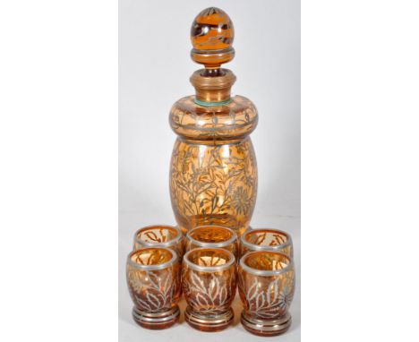 Argento Garantito 925/1000 amber glass decanter set with floral decorated silver overlay. Measures; 24cm tall