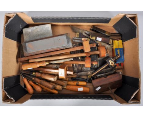 A group of tools to include sixteen chisels, angles, markers, spoke shave and others