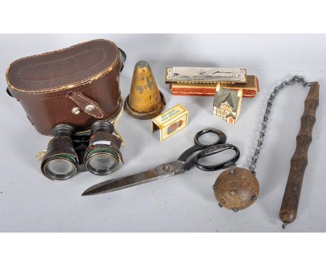 A pair of opera glasses, a M Hohner echo harmonica, a ball and truncheon, fabric shears and other items