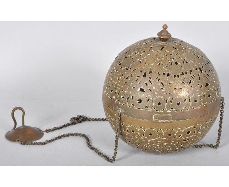 A brass hanging lamp with pierced decoration. Measures; 18cm diameter. 