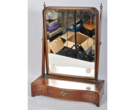 A 19th Century mahogany toilet swing mirror having a shaped mirror supported on angled squared supports with a three drawer b