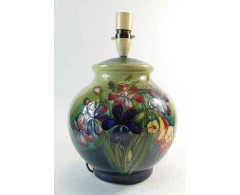 Walter Moorcroft large round lamp base decorated in the Spring Flowers design, height 23cm