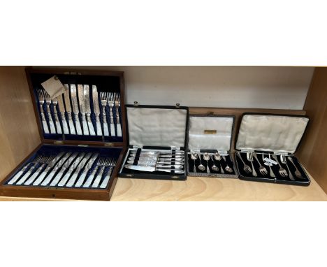 A set of six cased silver coffee spoons, together with silver cake forks, silver tea knives and a cased electroplated and mot