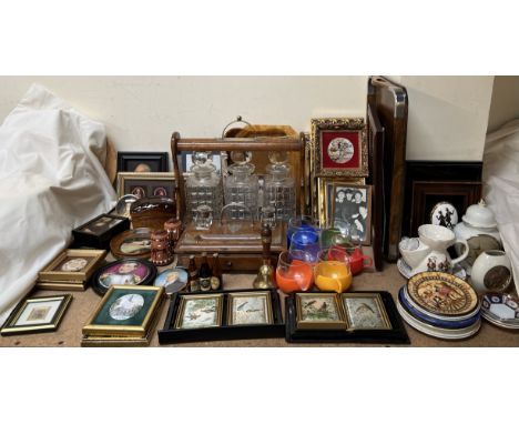 An oak and electroplated three decanter tantalus together with an oak desk standish, frames prints, tray, etc 