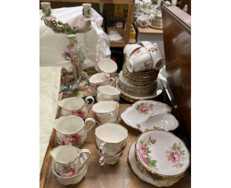 A Royal Albert American Beauty part tea service together with a candelabra and a bird etc