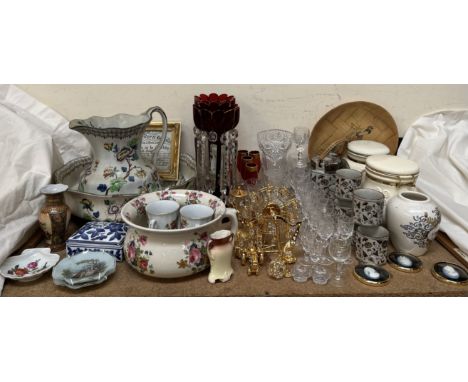A pair of cranberry glass table lustres together with drinking glasses, frames jasper ware portrait miniatures, storage jars,