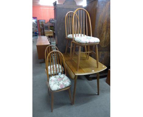 An Ercol style light oak drop-leaf table and four chairs
