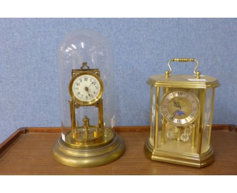 A German Hermle mantel clock and a brass anniversary clock