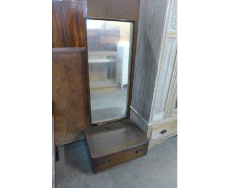 An Ercol cheval mirror