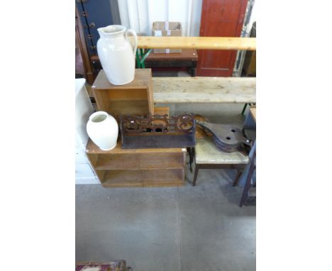 Two open bookcases, a mahogany wine table, a mahogany piano stool, fire bellows, a wall shelf and two vases