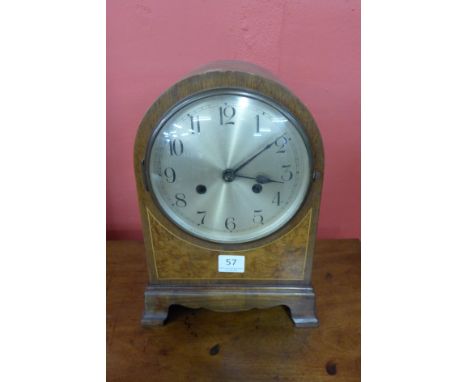 An early 20th Century mahogany and burr walnut bracket clock