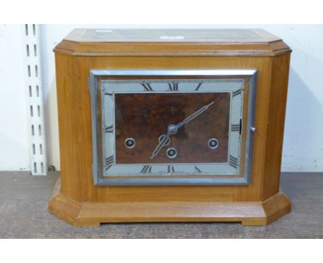 An Art Deco walnut mantel clock