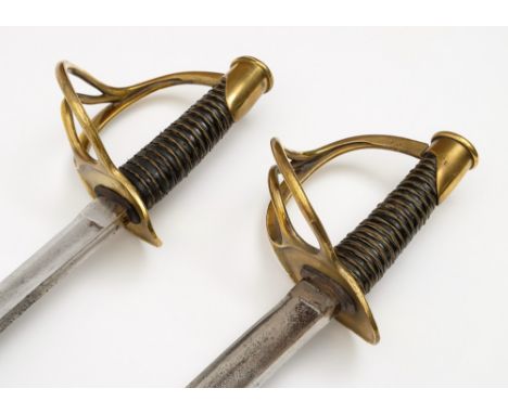 Two 19th century Continental Light Infantry officers swords:, both having curved single edge fullered blades over an oval bra