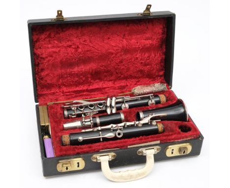 A 20th century English clarinet:, numbered 256818 with silver plated keys, in a fitted case.