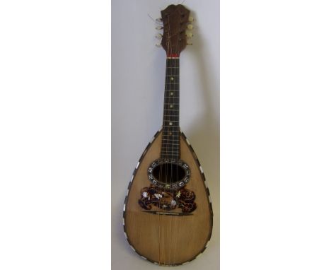 An Italian rosewood and tortoiseshell inlaid mandolin: with mother of pearl strung border, bears paper label Stridente, Napol